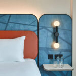 Head on shot of refurbished Leonardo hotel bed frame and head and side table.